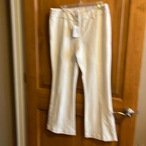 Chico’s ladies Ecru flare leg pants.  New never worn. Dress up or down